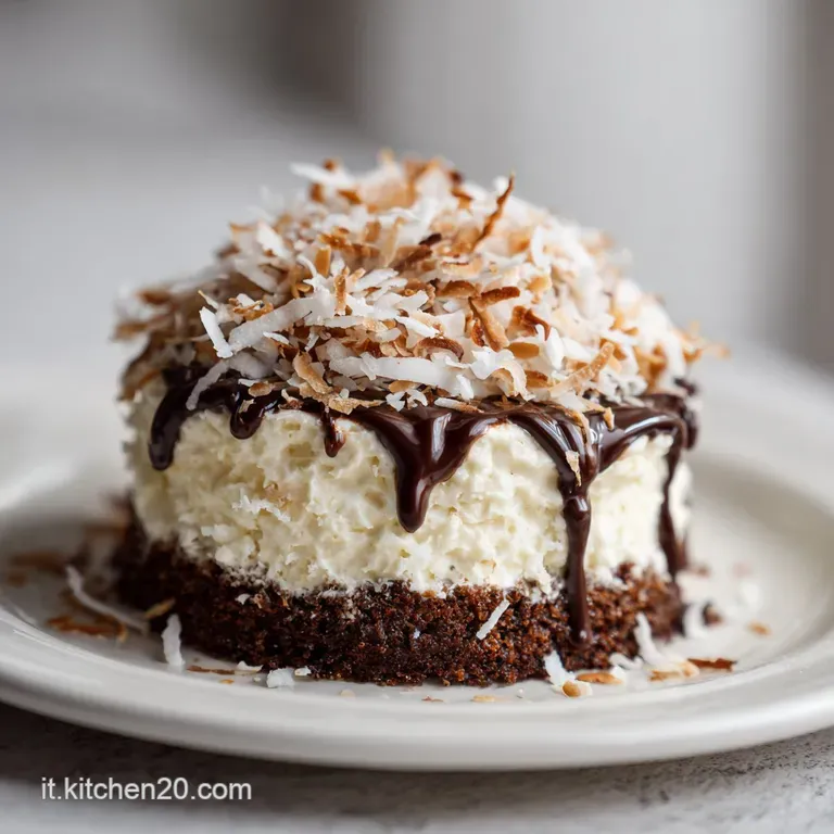 Slice of dark chocolate coconut cake on a white plate, cocoa dusting, highlighting the moist crumb and visible coconut fla...
